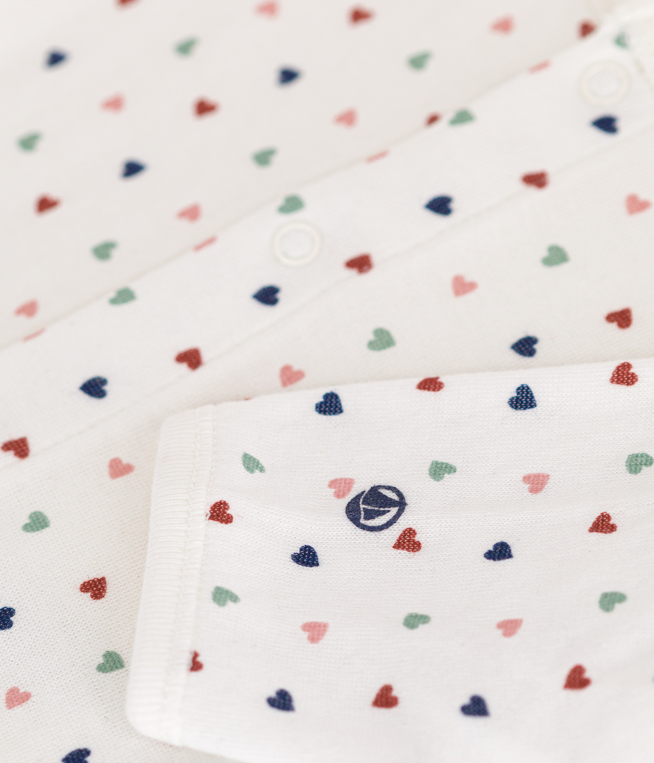 Babies' bodyjama in mini-heart print tube knit