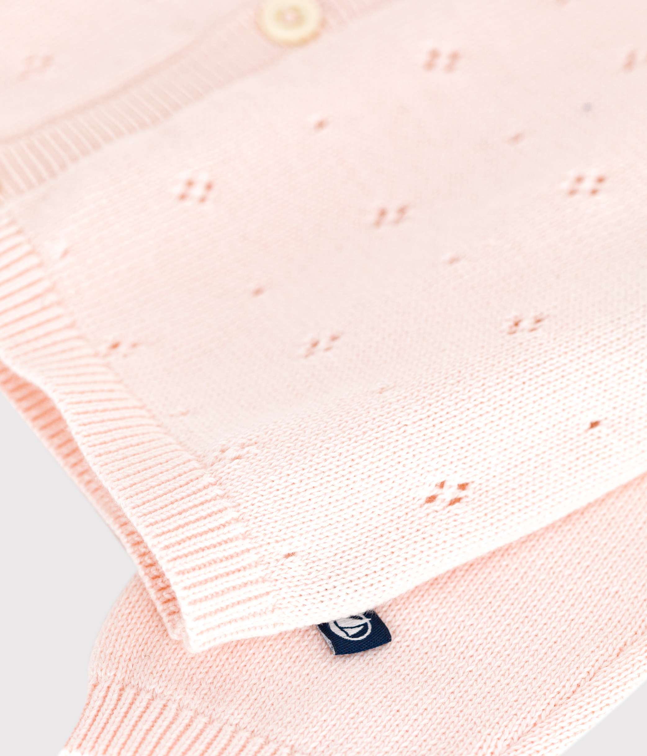 Babies' cotton cardigan in a decorative stitch