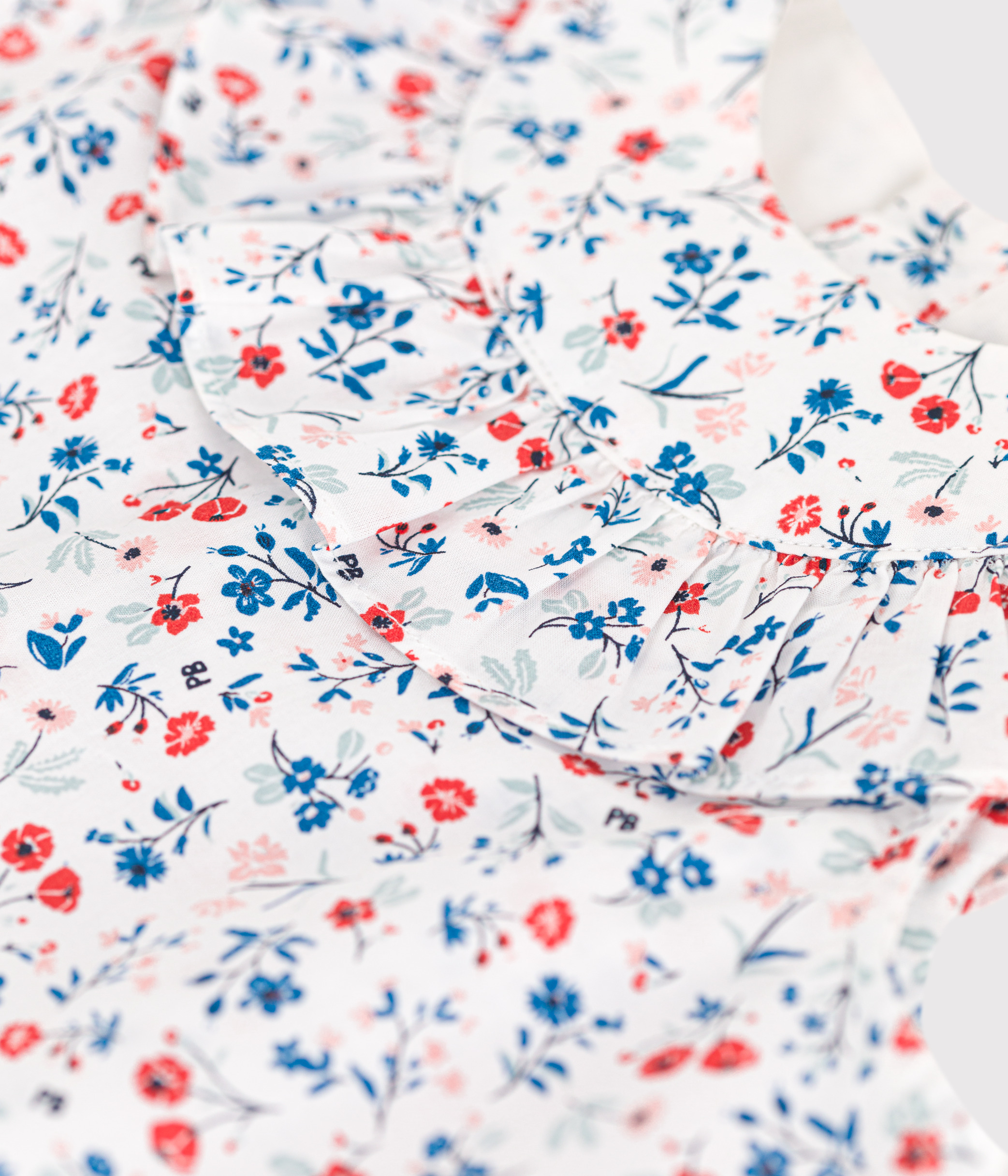 Babies' sleeveless floral print cotton blouse