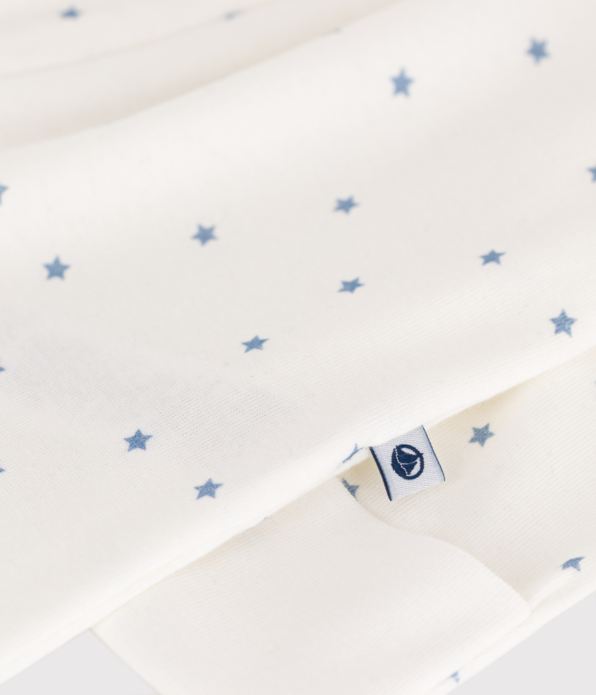 Baby cotton pajamas with a collar and star print