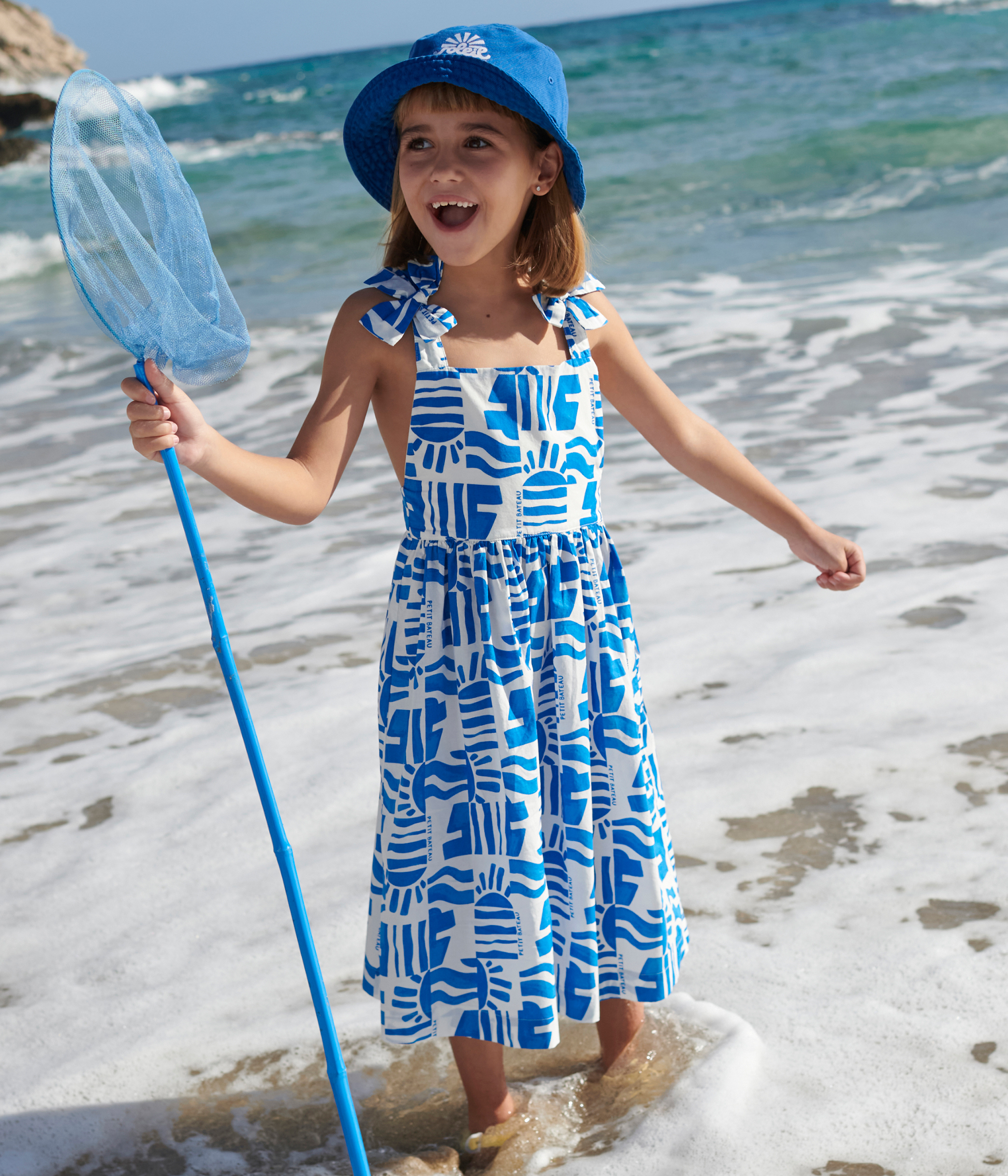 Children's long strappy dress in printed cotton