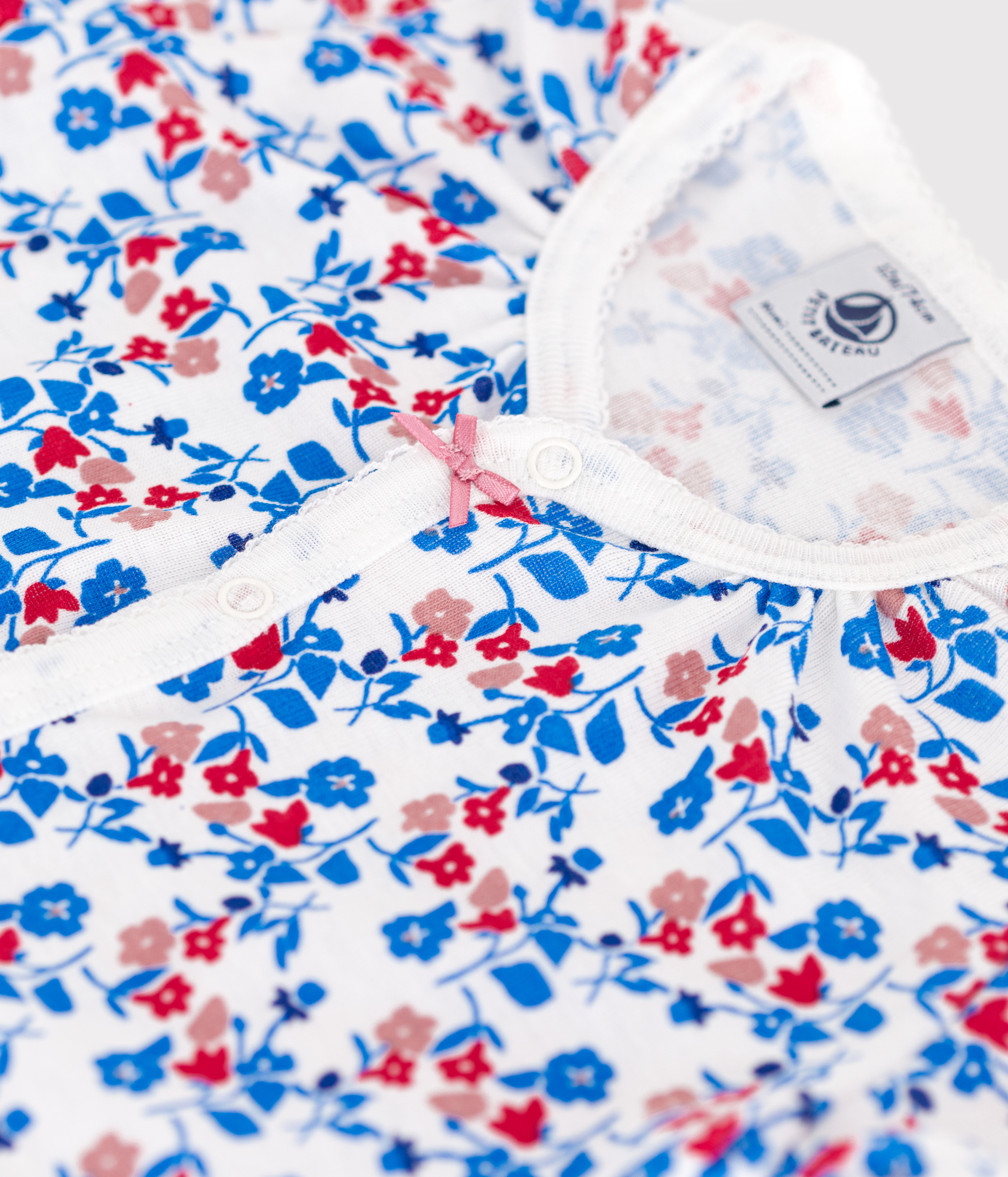 Baby short romper in floral cotton