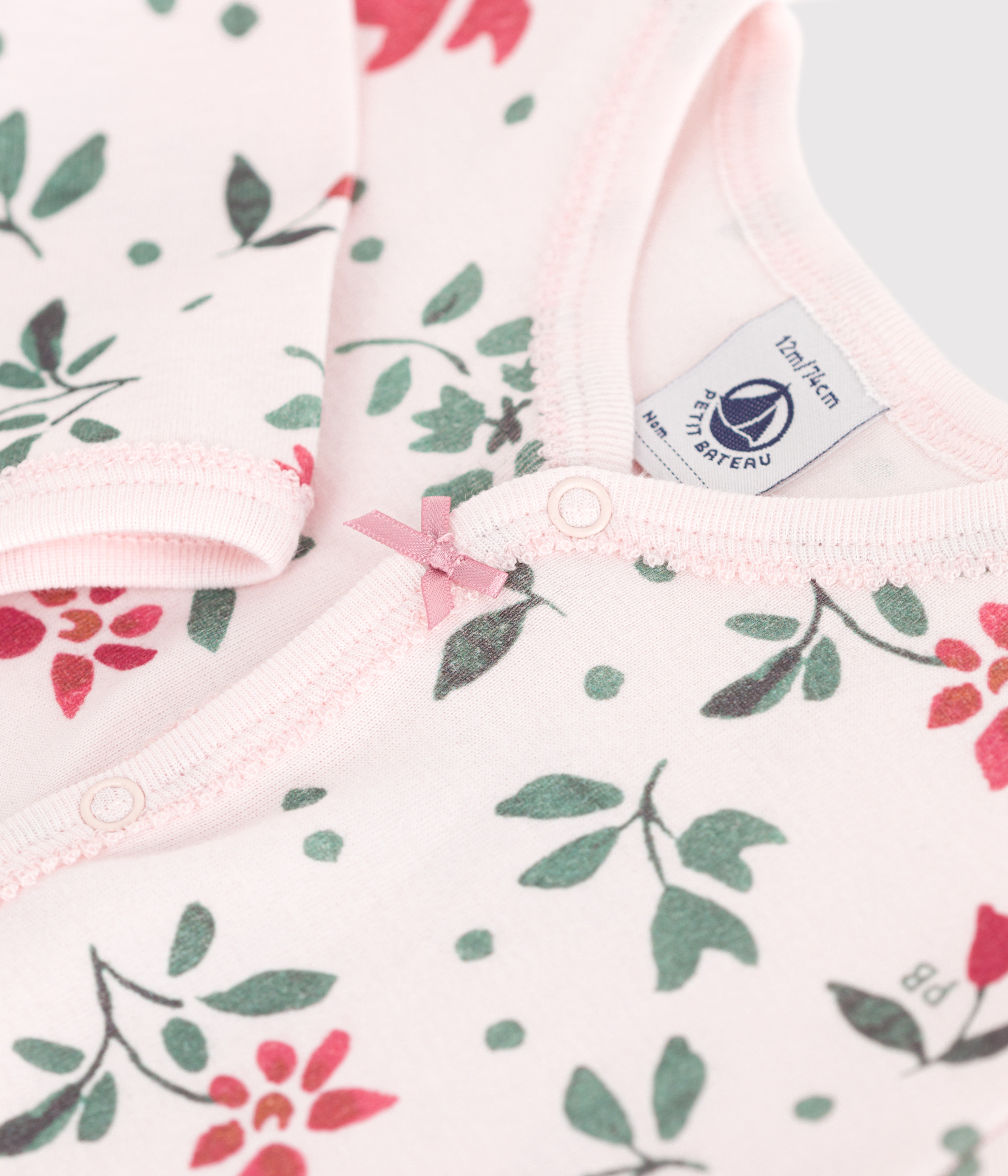 Baby footless cotton pyjamas with floral print