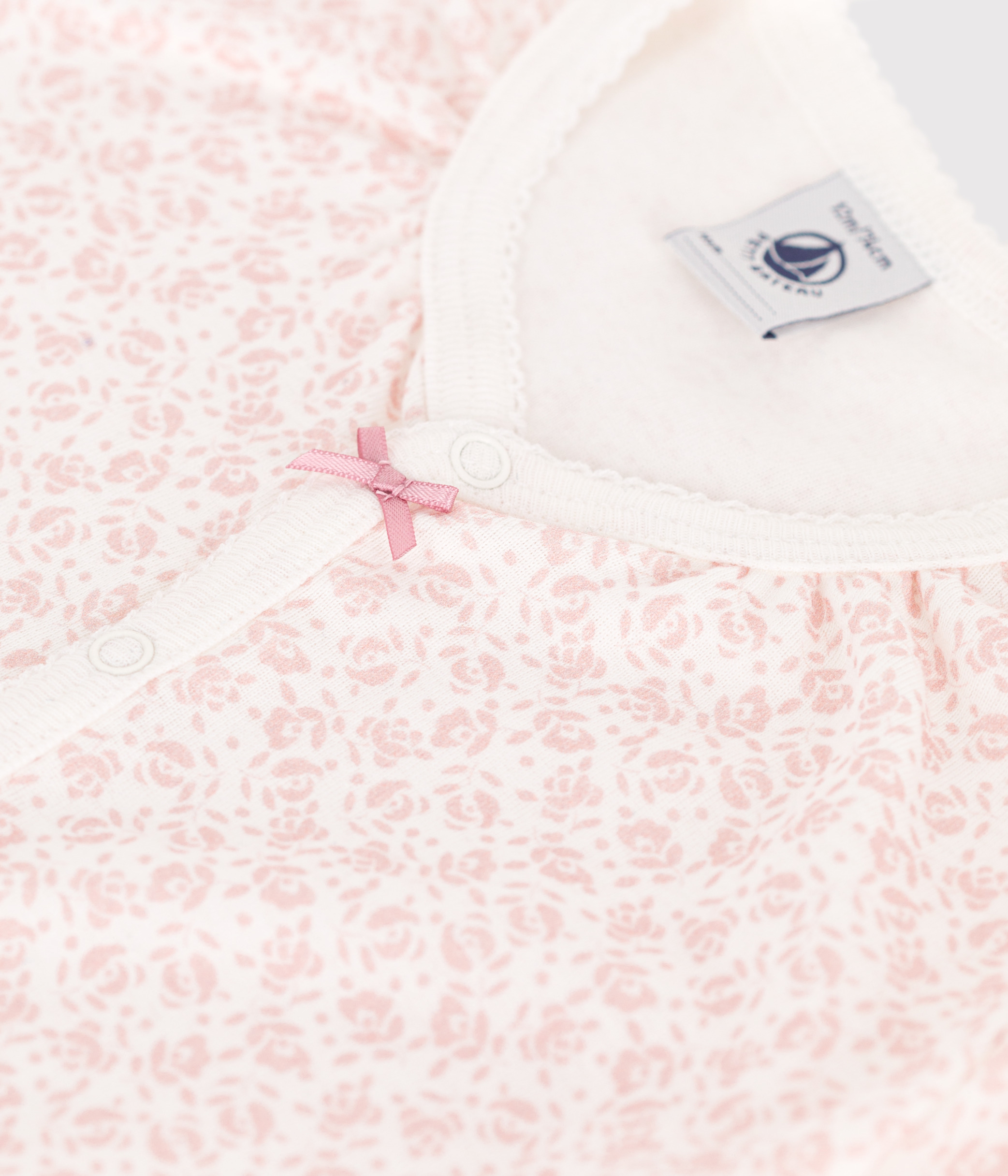 Baby short romper in floral cotton