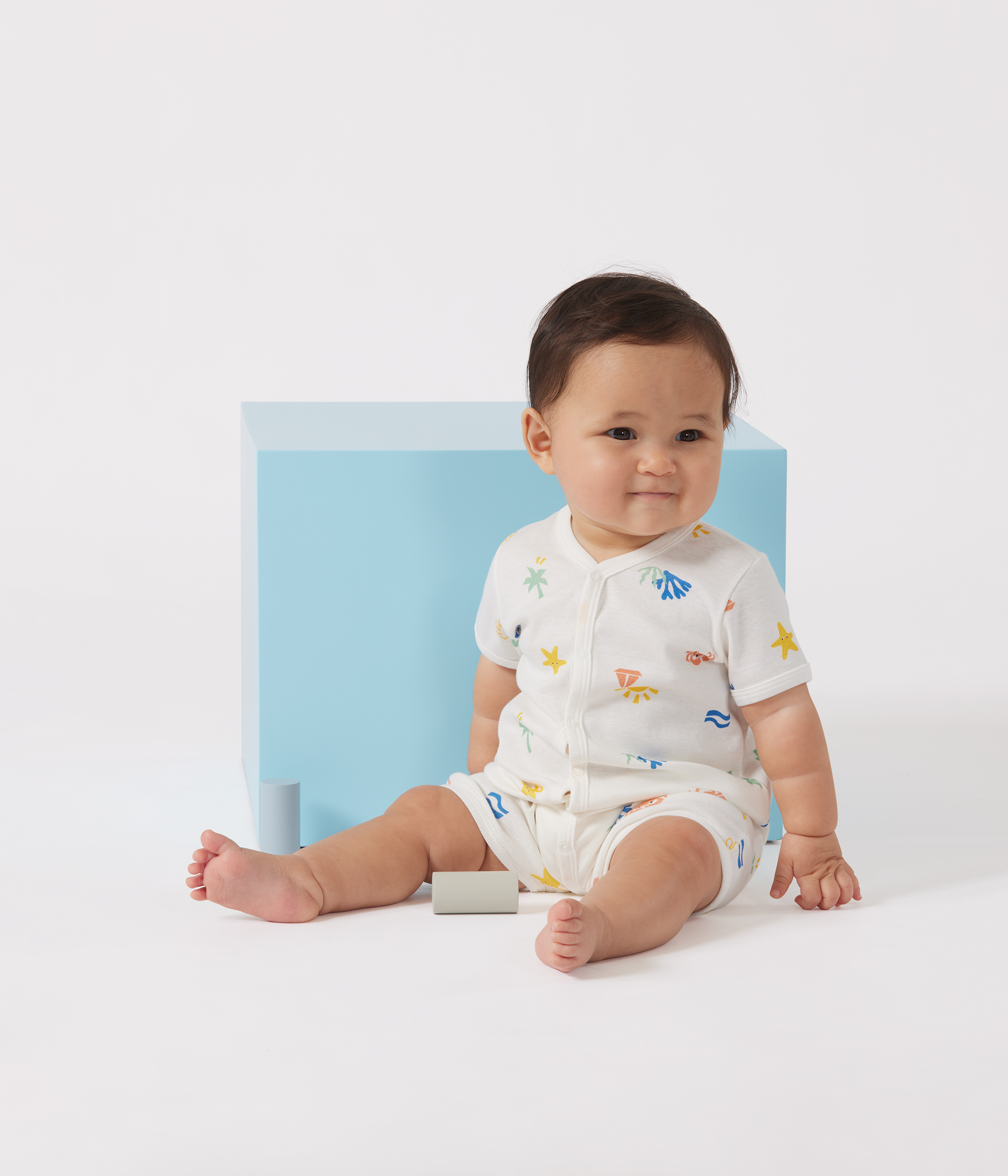 Baby cotton short jumpsuit with print