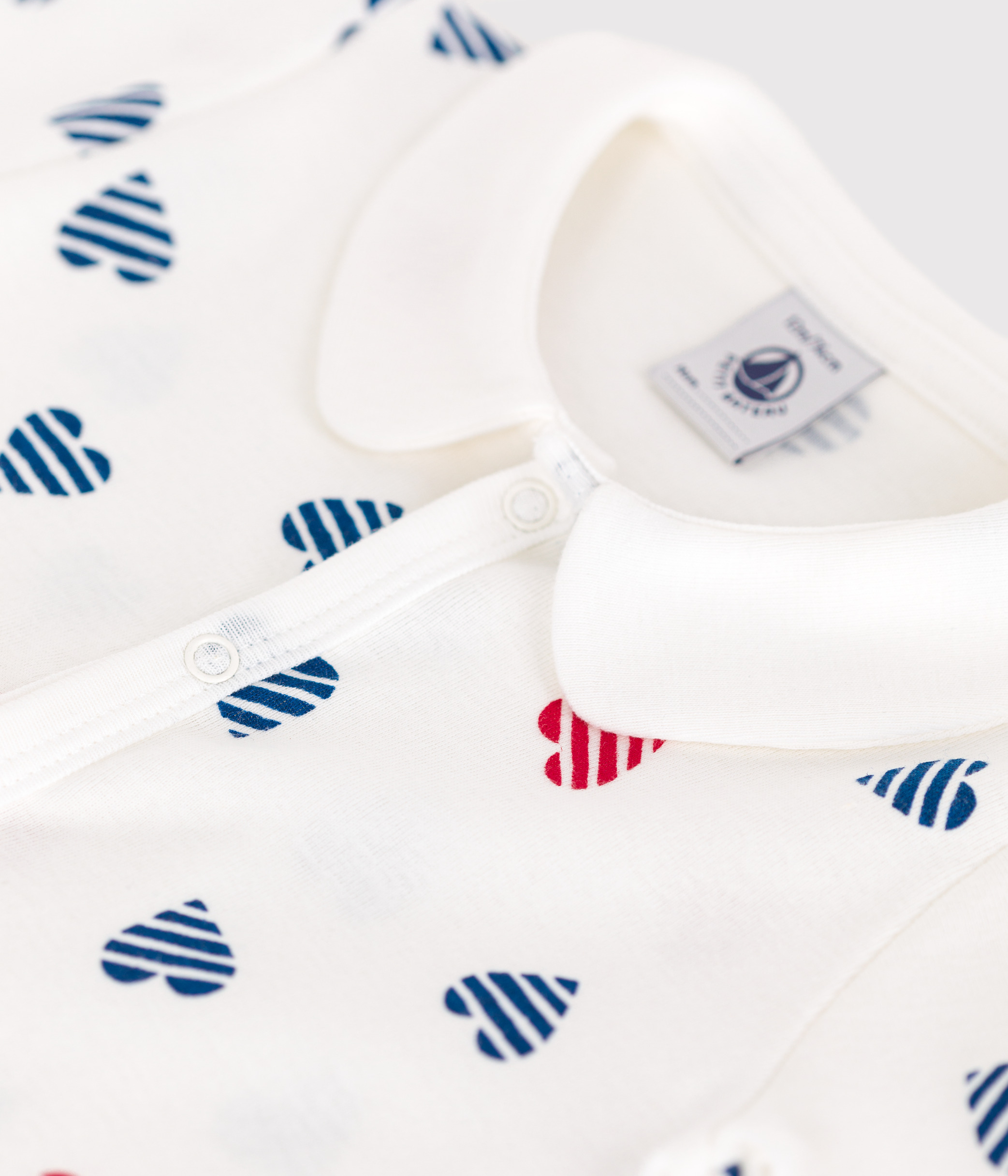 Baby short romper in cotton with striped heart collar