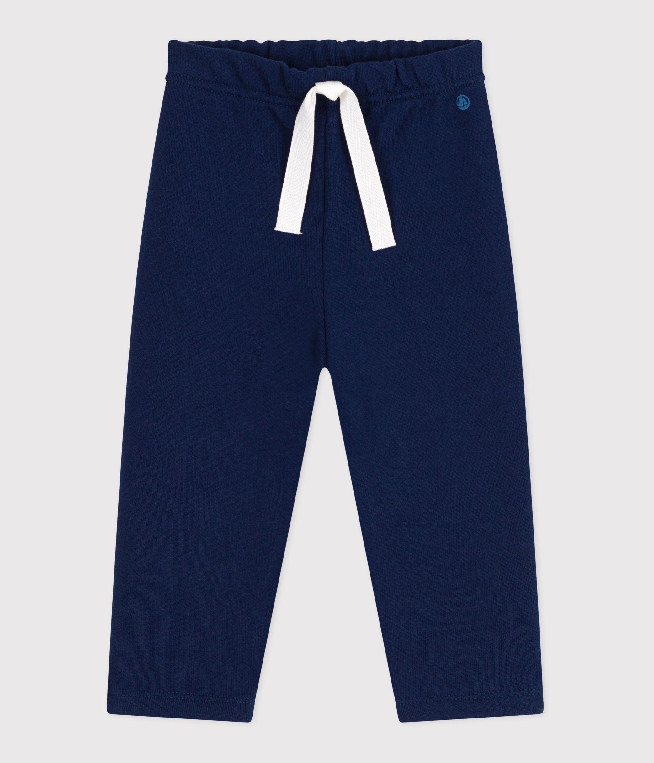 Babies' jogging bottoms in plain cotton