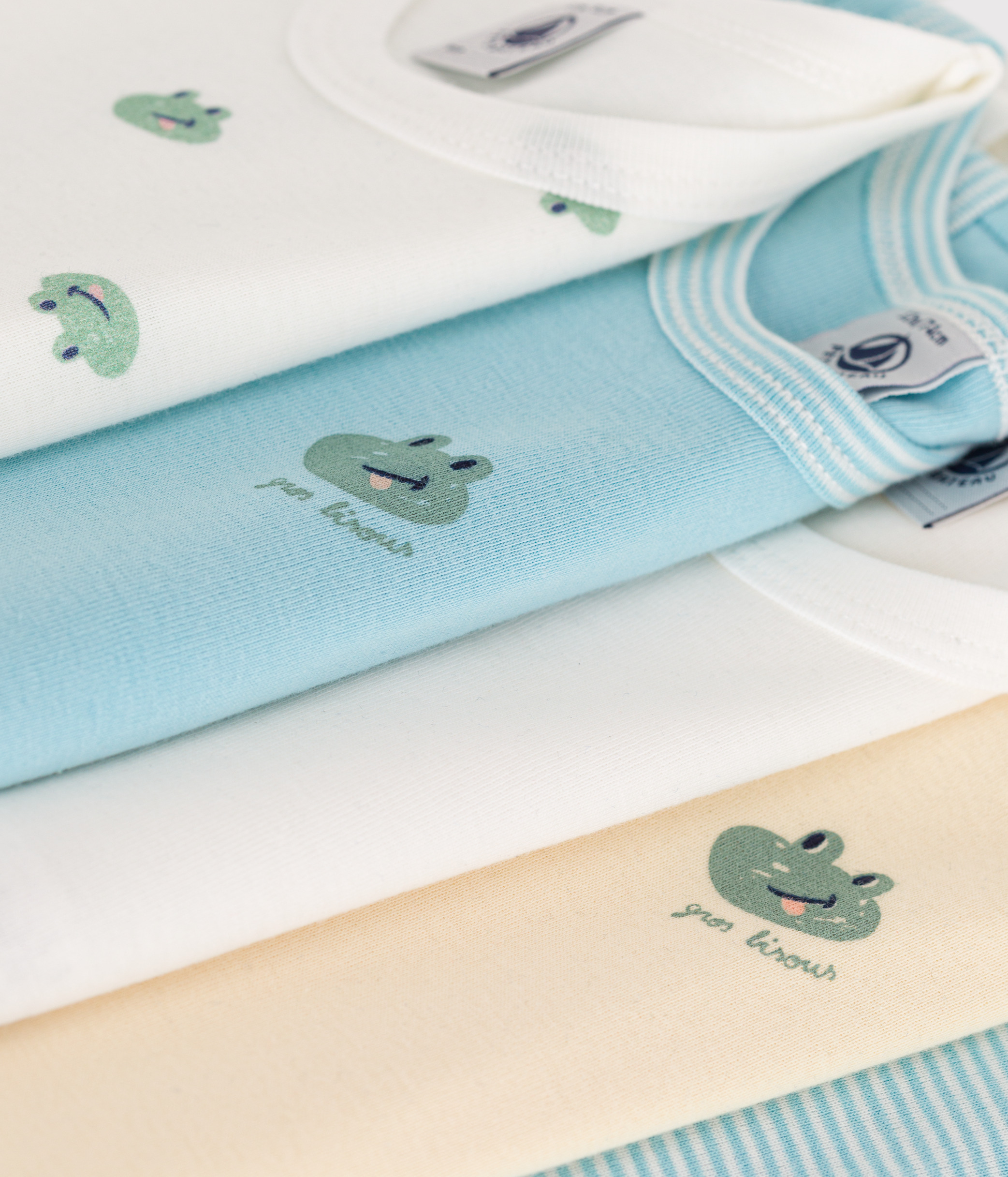 Set of 5 baby sleeveless cotton printed bodysuits