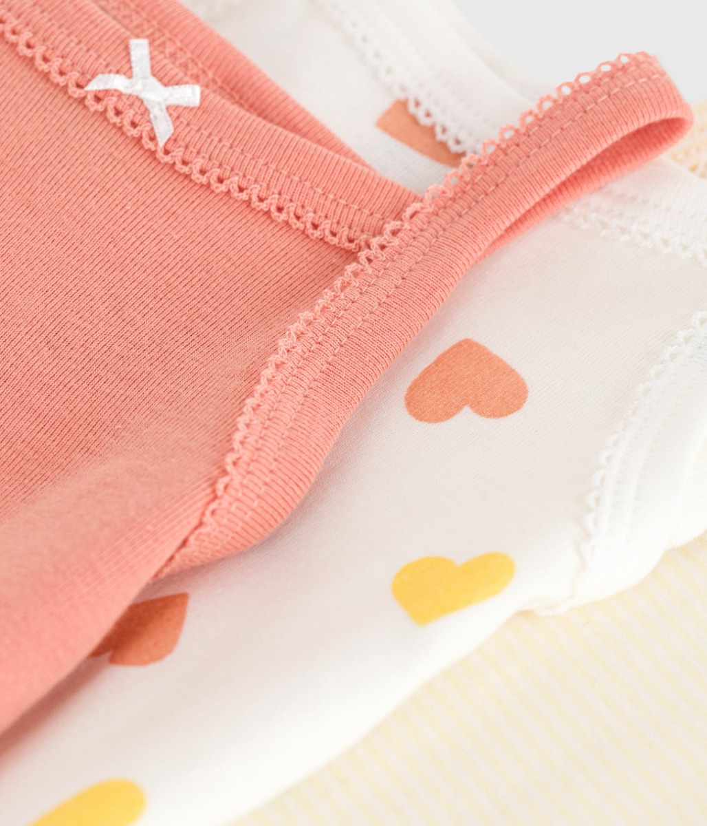 Set of 3 baby cotton bodysuits with straps and hearts
