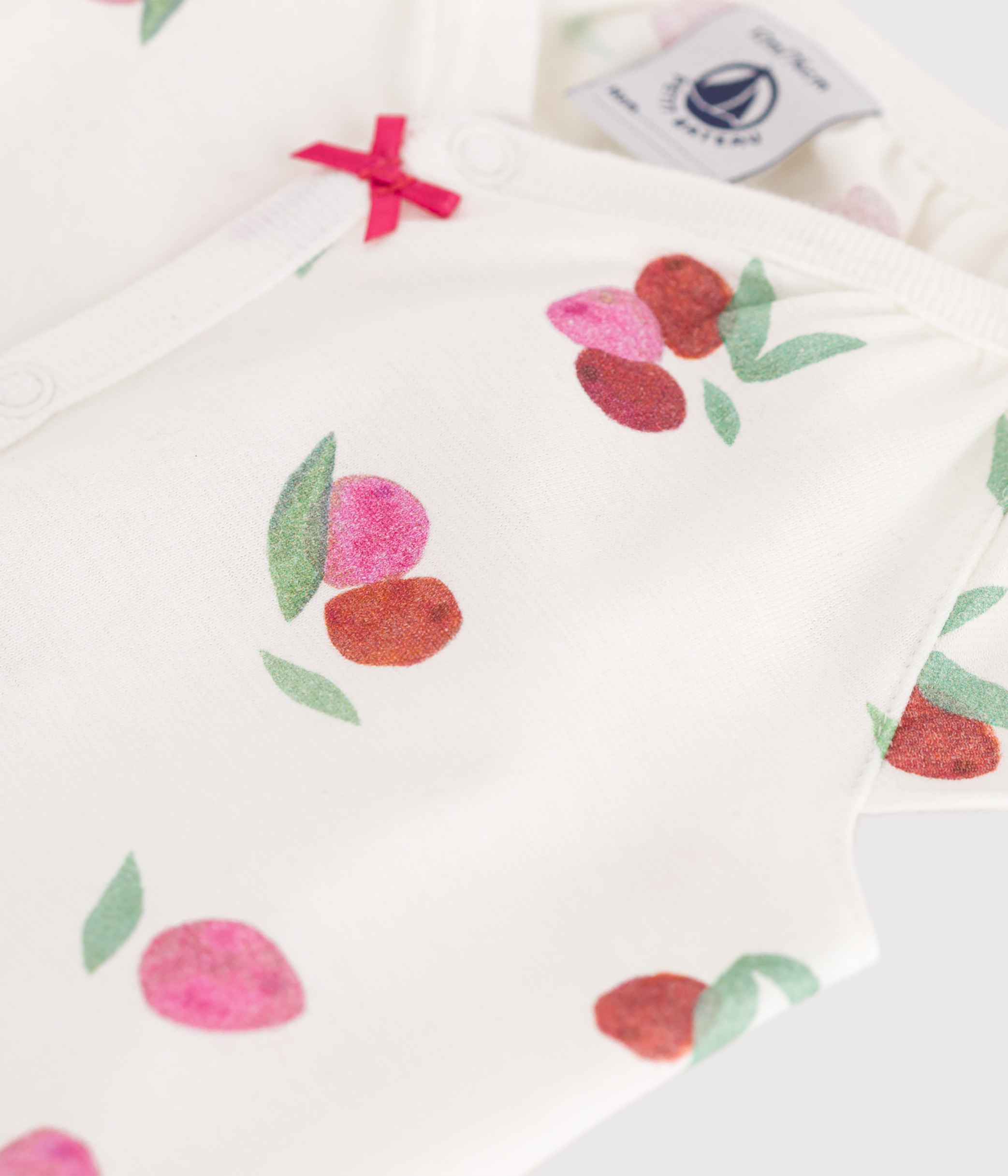 Baby short romper in cotton with fruit print