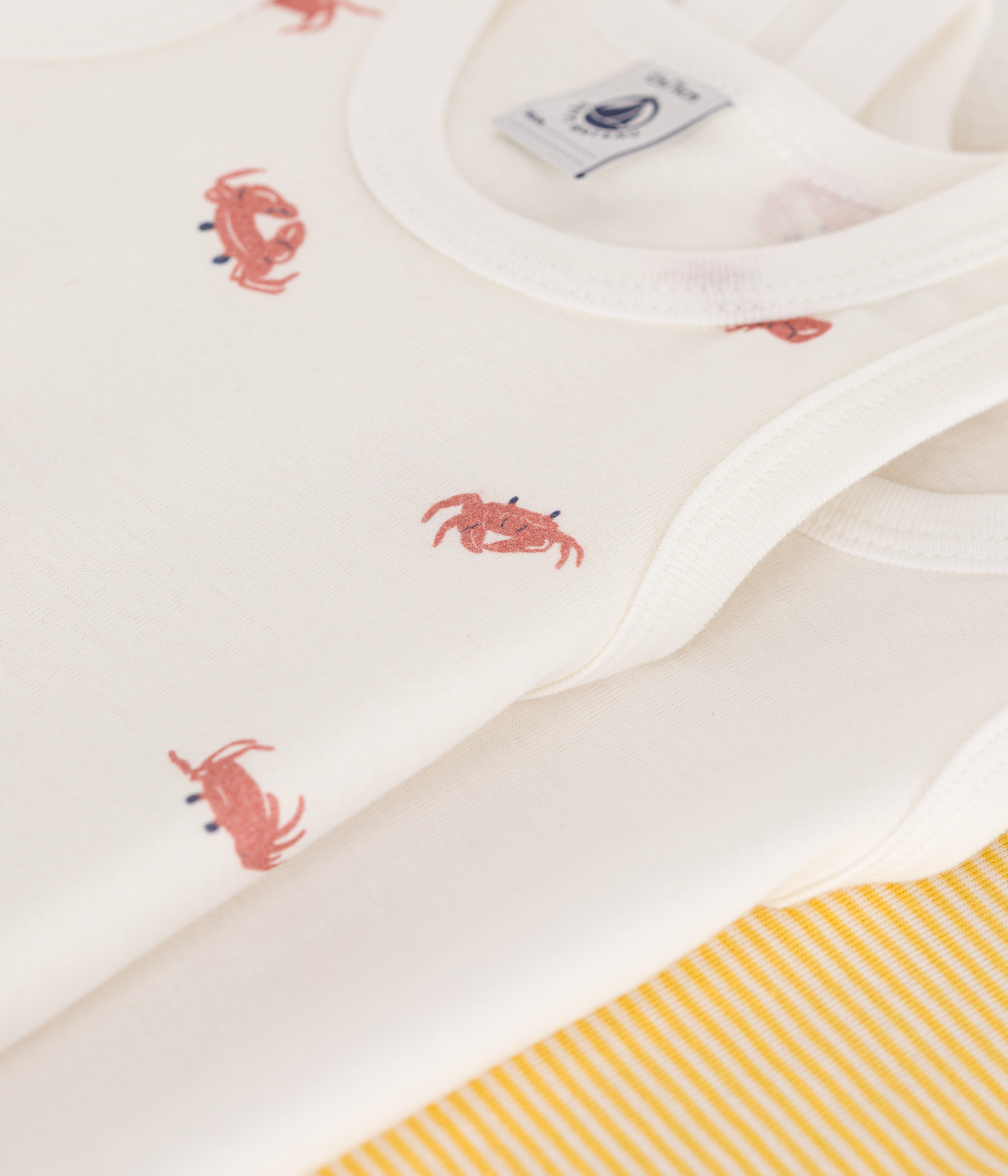 Set of 3 baby sleeveless cotton bodysuits with crab print