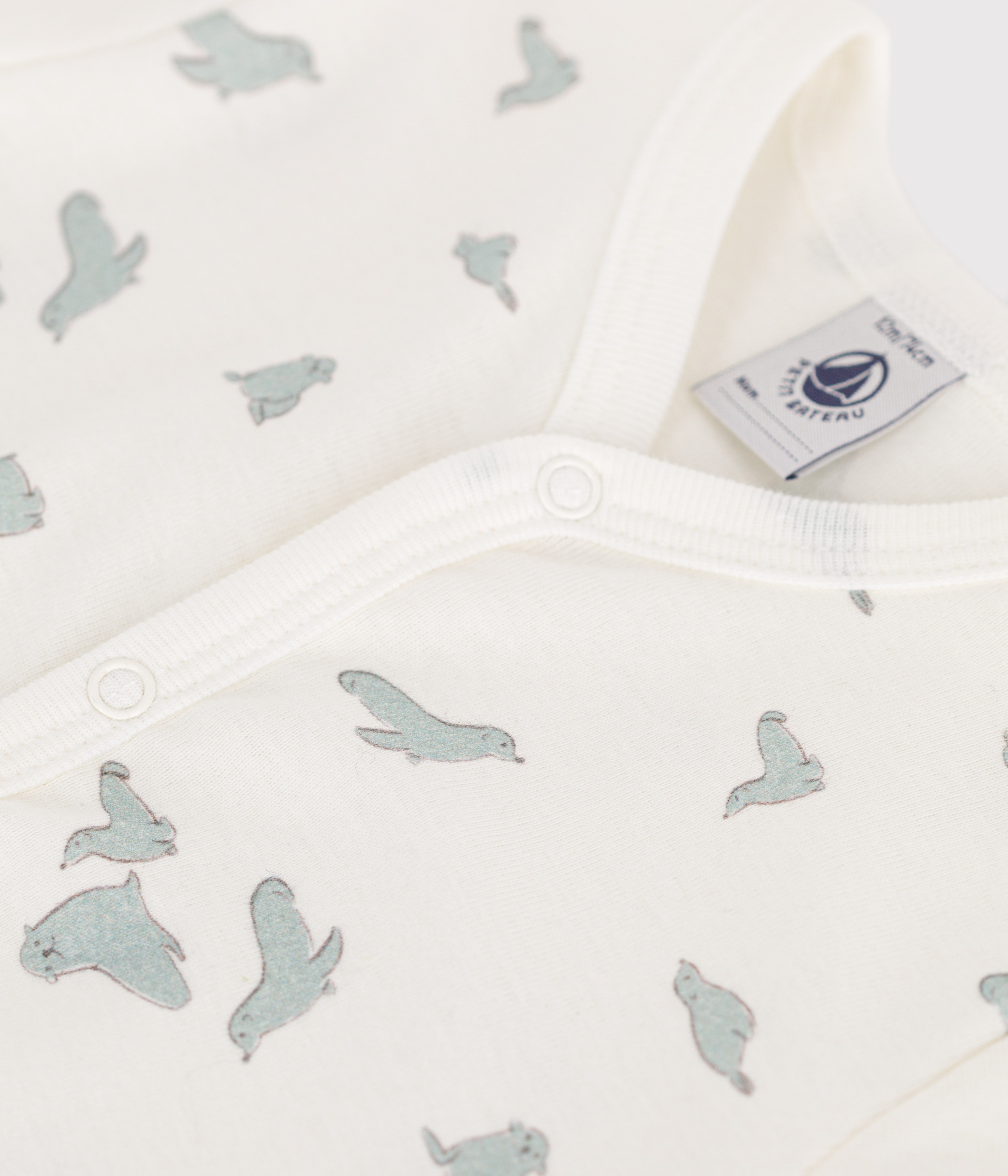 Baby short romper in cotton with seal print