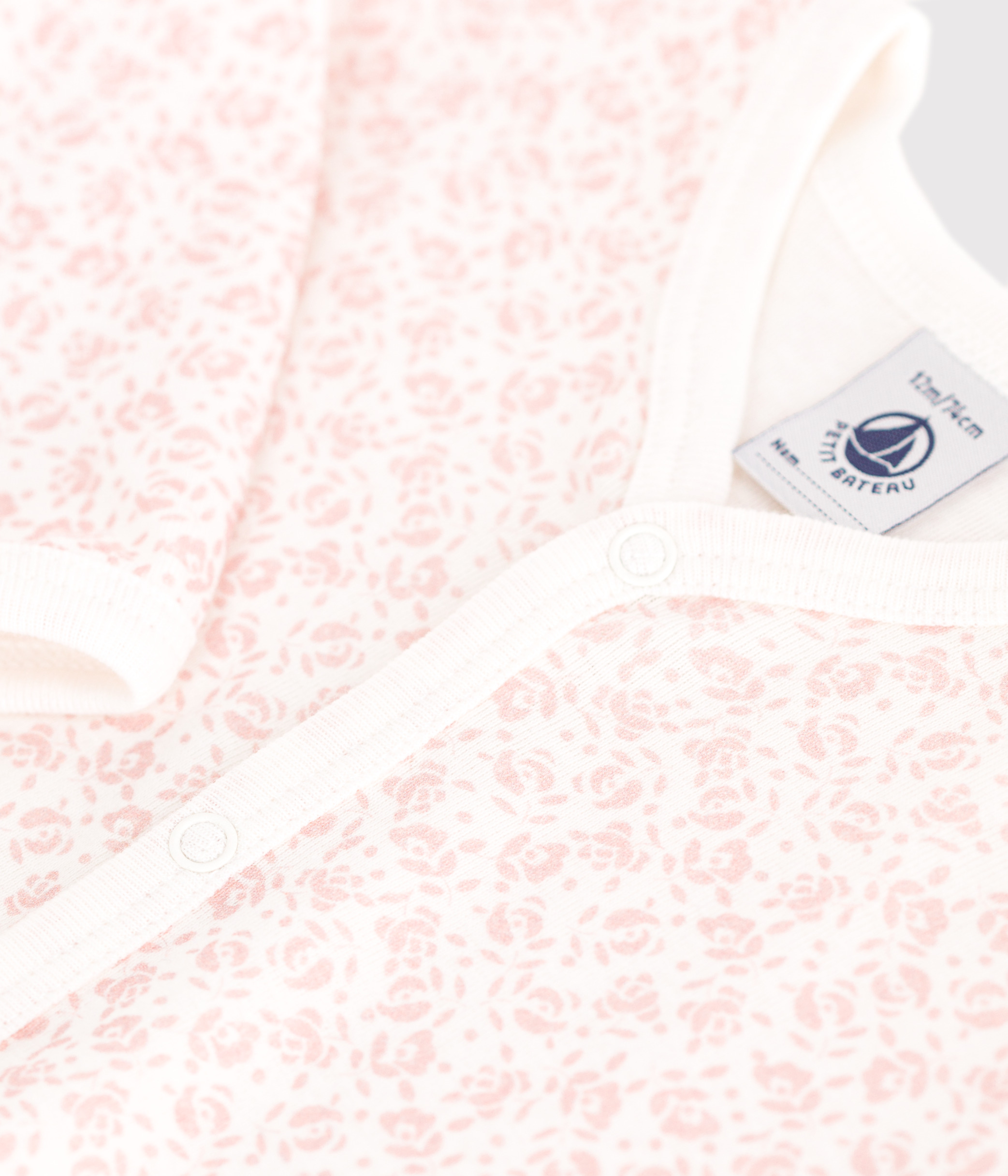 Baby footless cotton pyjamas with floral print