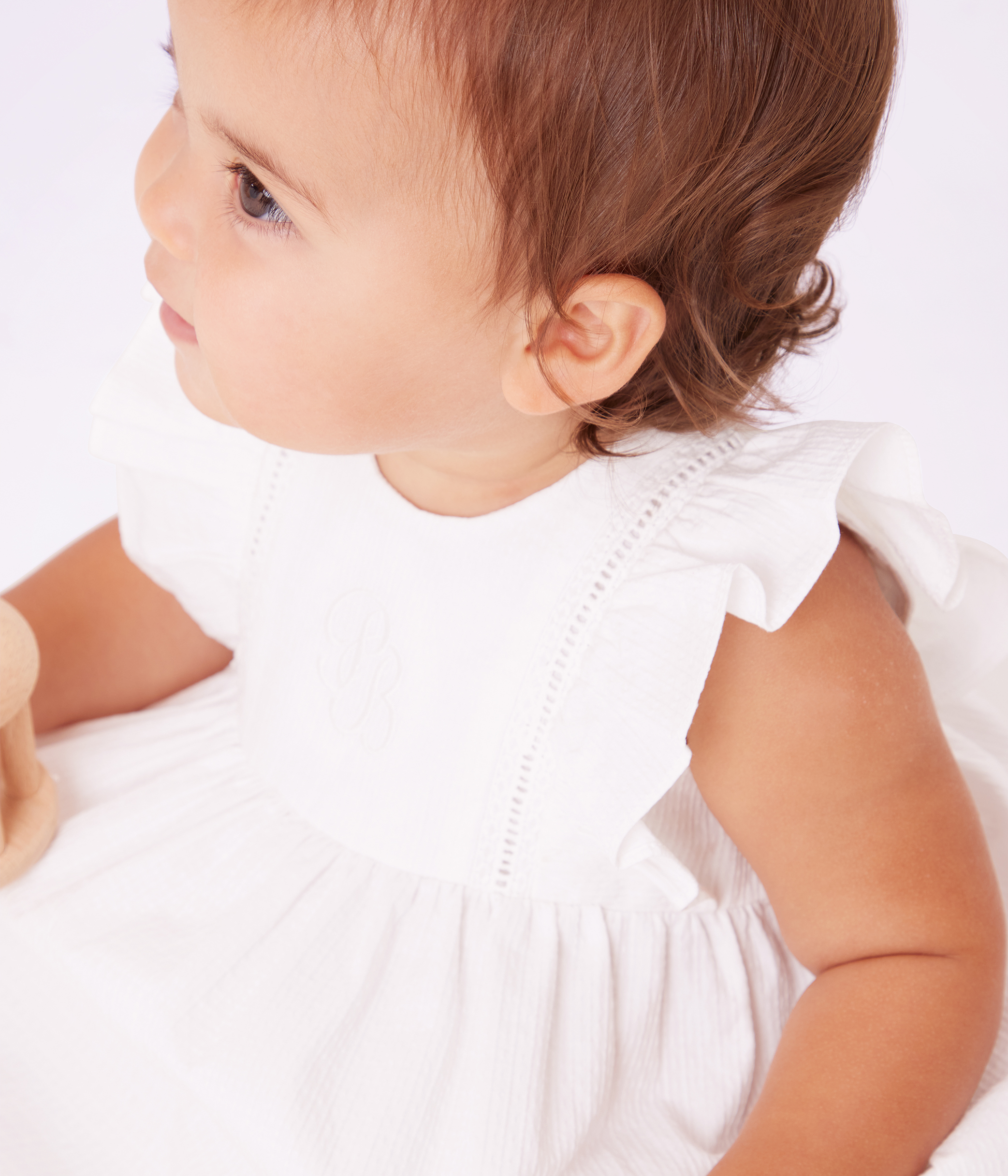 Babies' plain and embroidered sleeveless cotton dress with matching bloomers