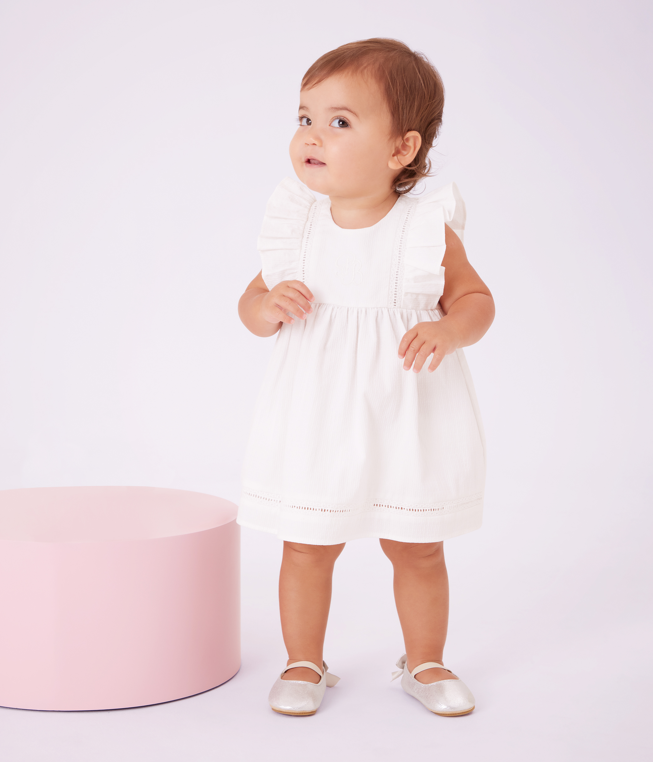 Babies' plain and embroidered sleeveless cotton dress with matching bloomers