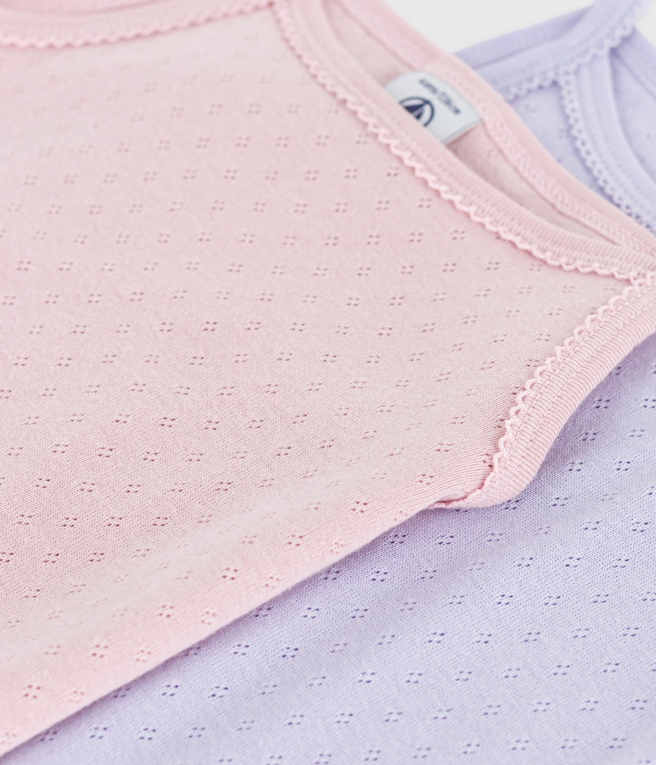 Pack of children's strappy openwork cotton vests