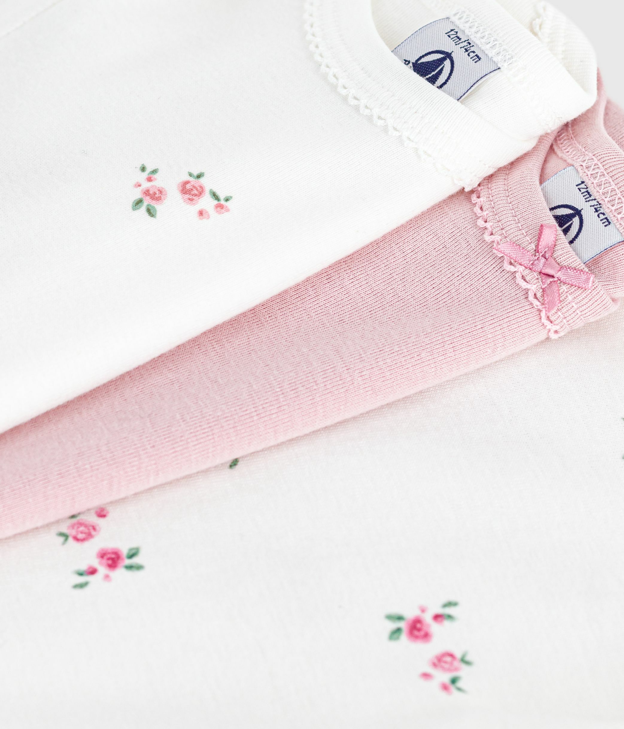 Pack of short-sleeved floral-print cotton bodies for babies