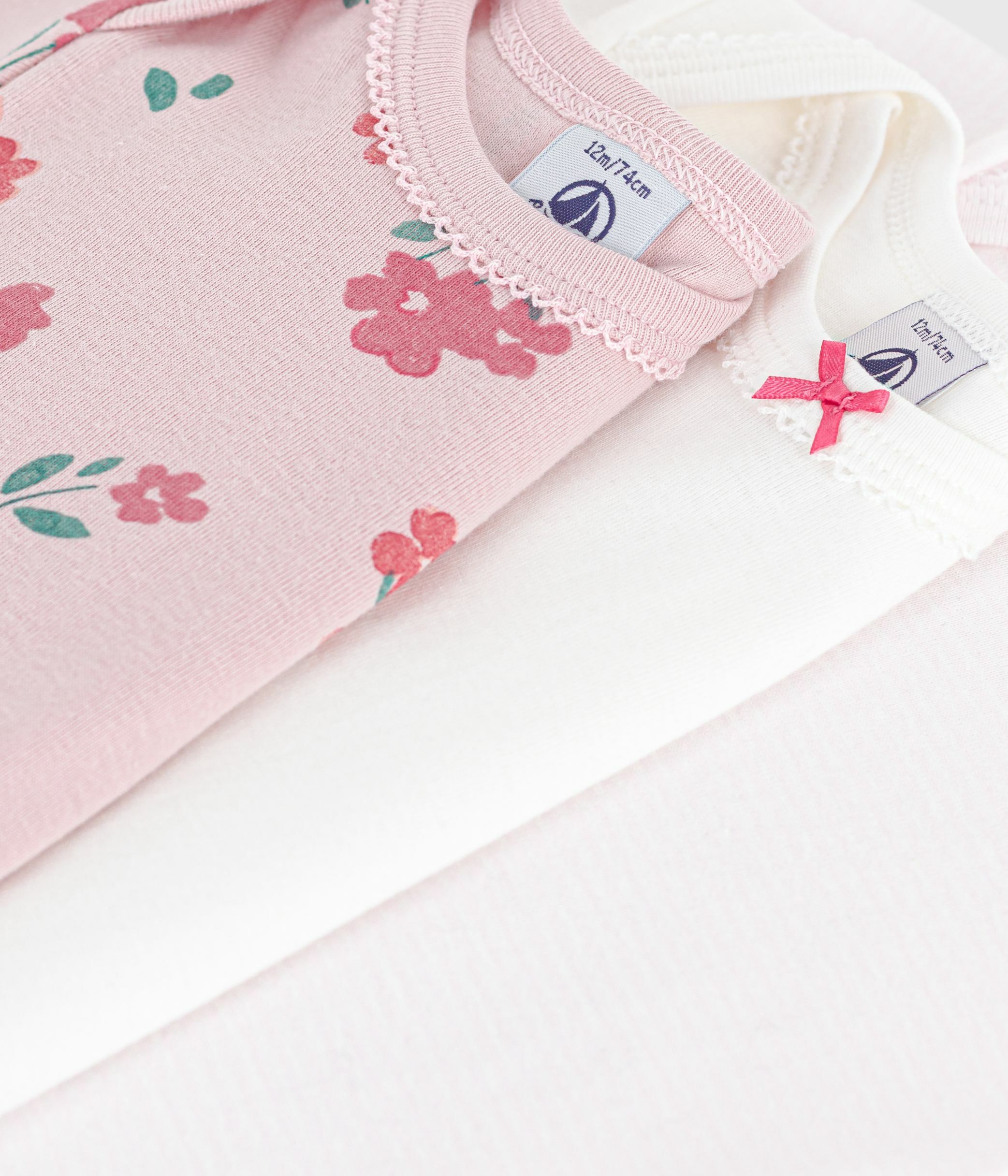 Pack of short-sleeved floral-print cotton bodies for babies
