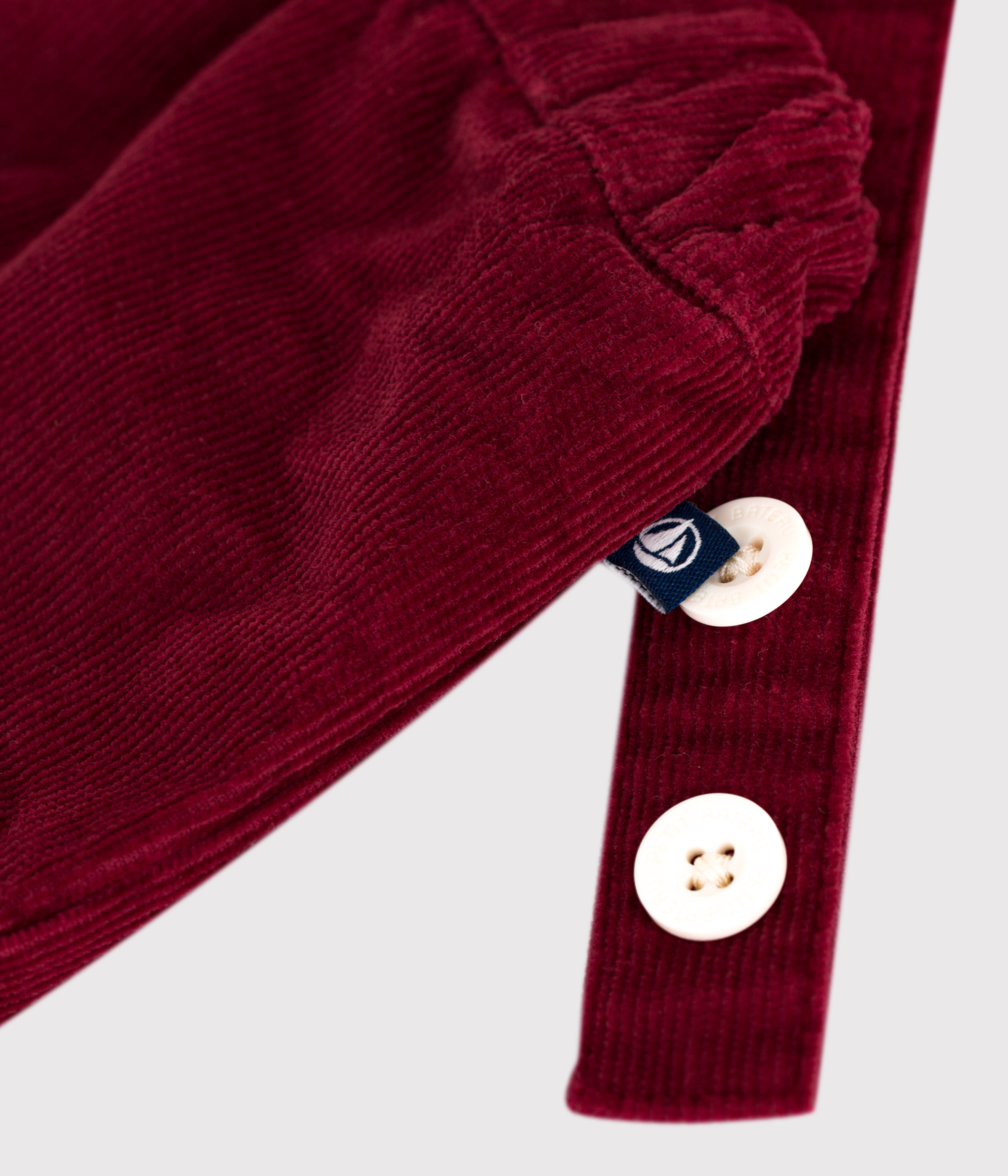 Babies' plain corduroy shorts with shoulder straps