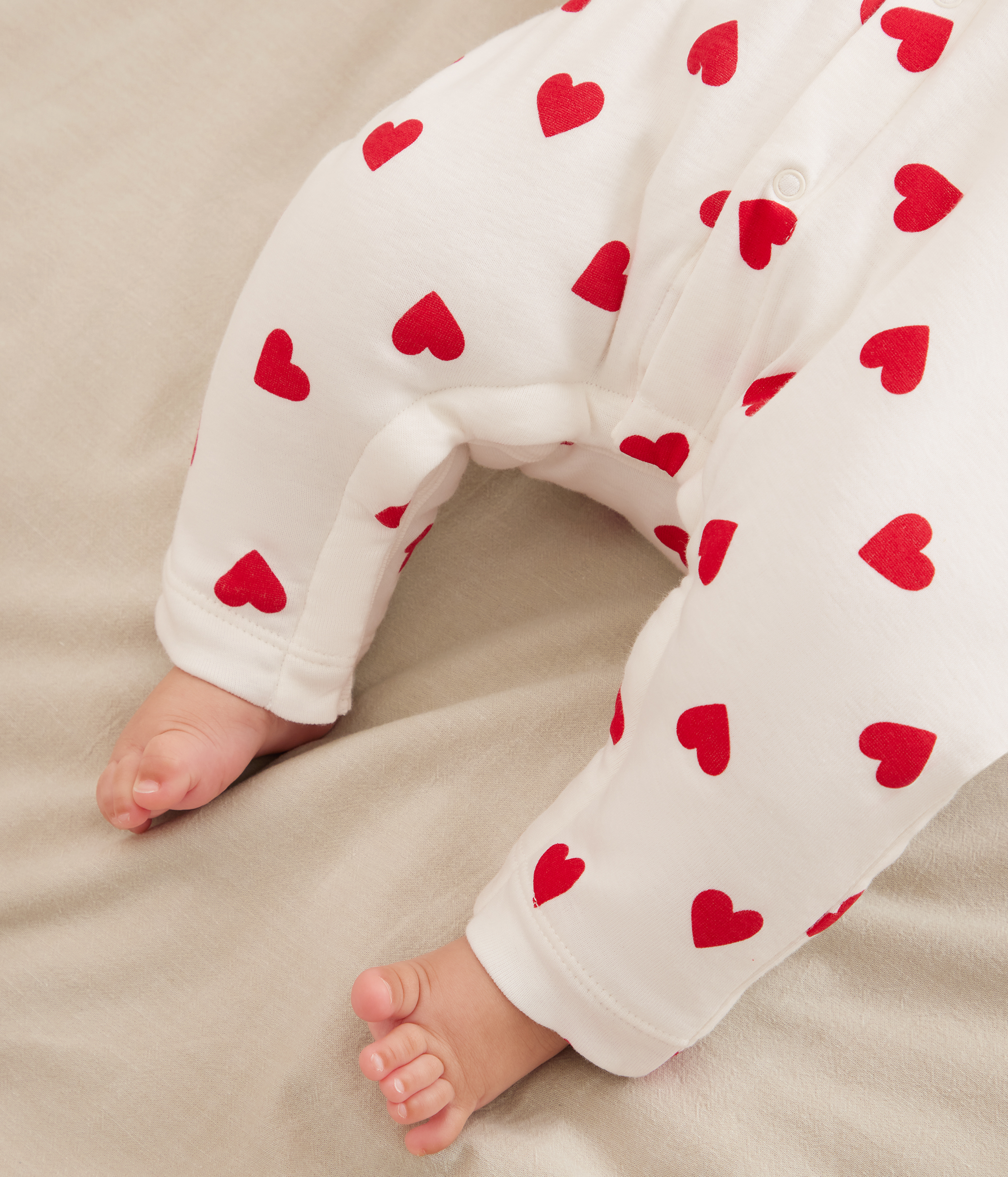 Babies' padded heart-print cotton playsuit.