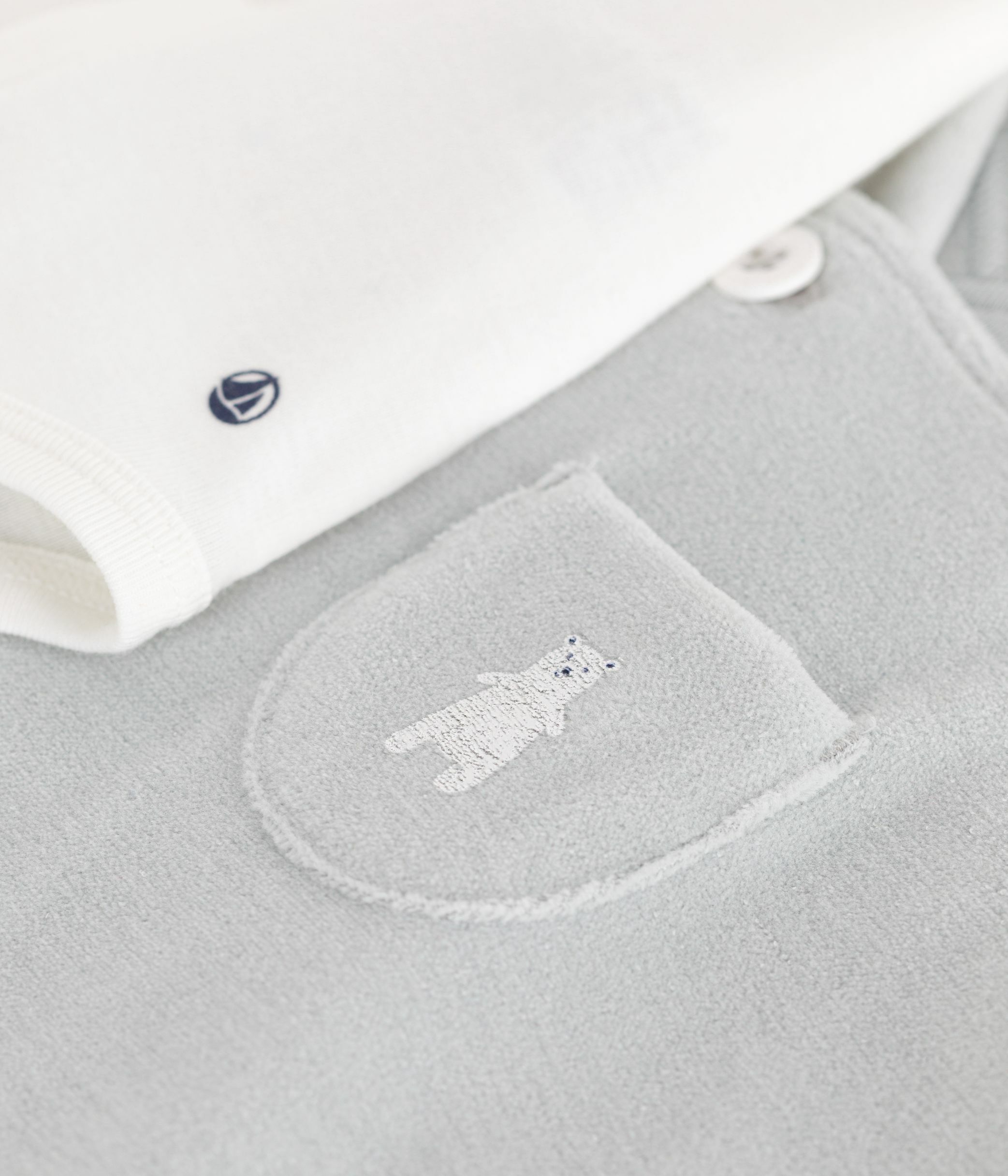 Babies' dungarees in plain cotton with stylish details