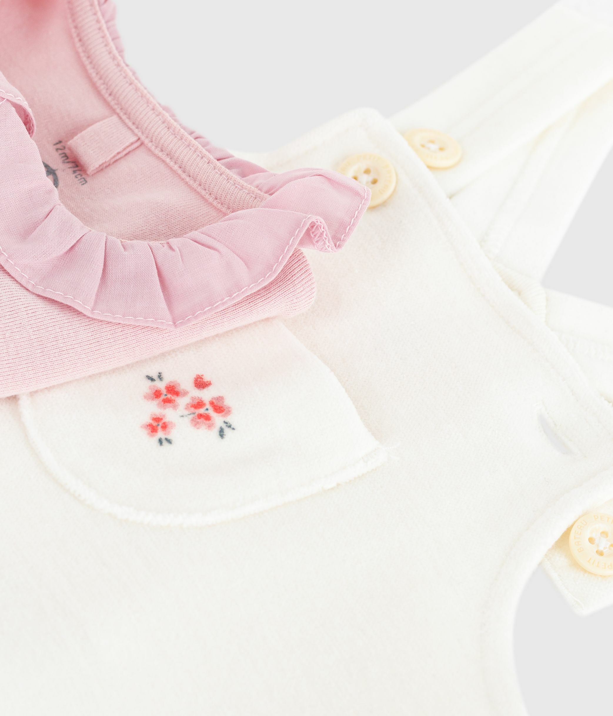 Babies' dungarees in plain cotton with stylish details