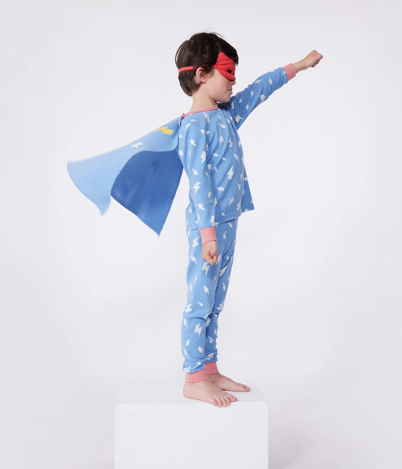 Children's short fancy dress pyjamas in glow-in-the-dark cotton with a cape