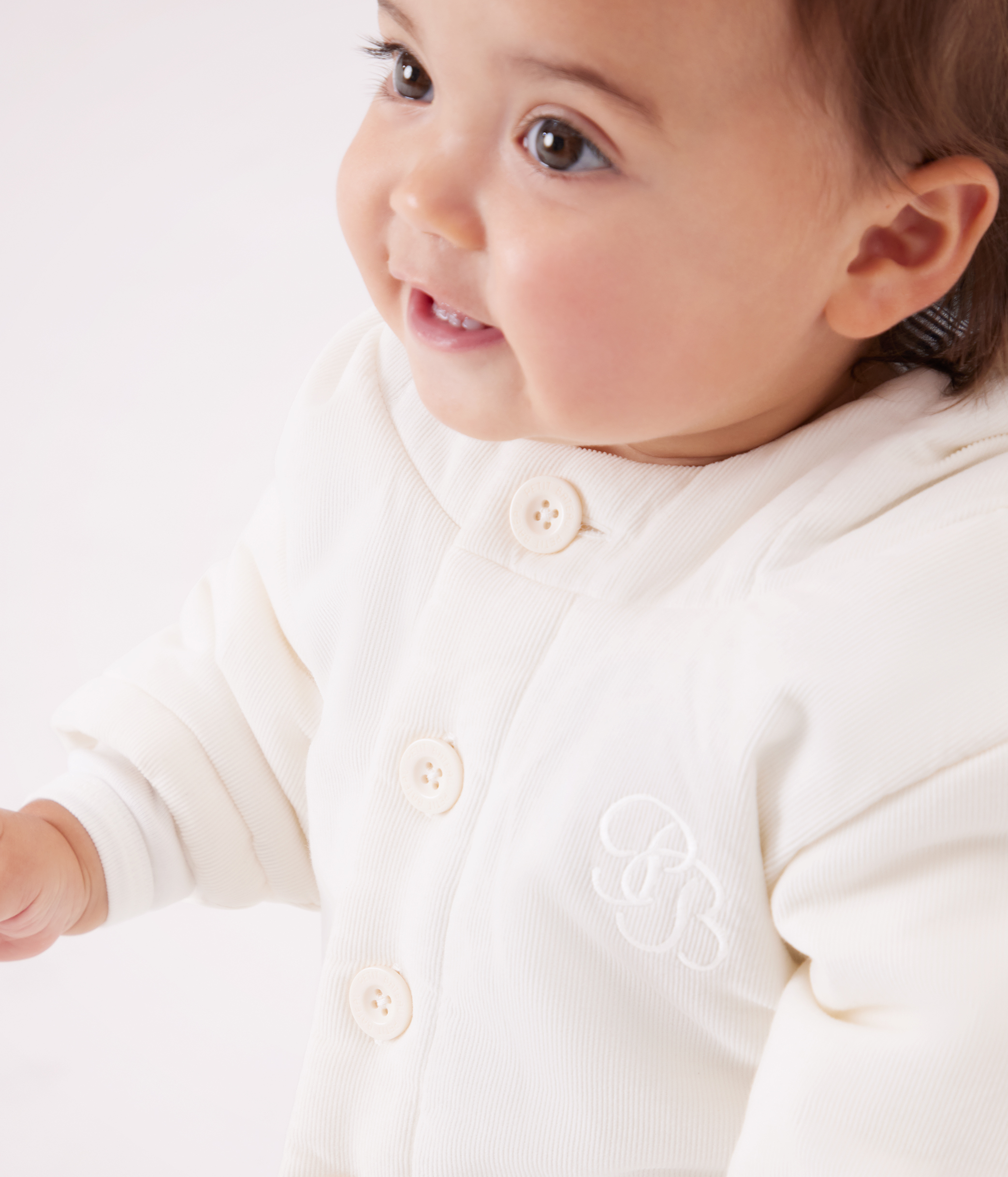 Babies' padded jacket in embroidered velour with a pinstriped lining