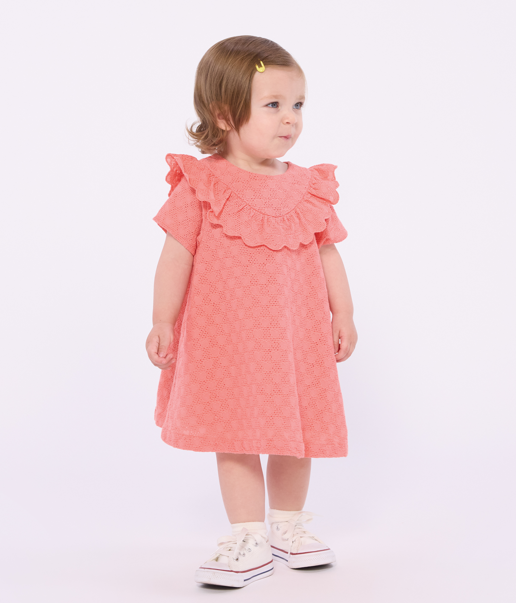 Babies' dress in broderie anglaise with short sleeves and a hearts motif