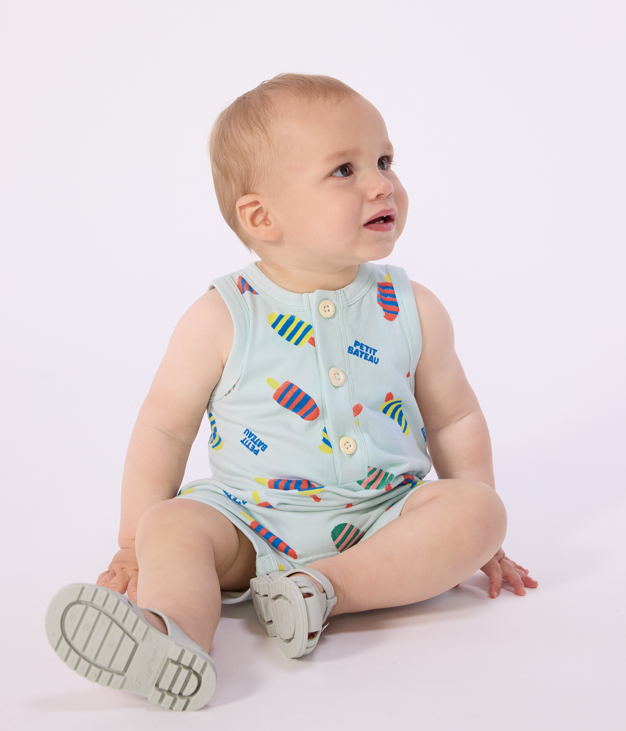 Babies' short cotton playsuit with an ice cream print