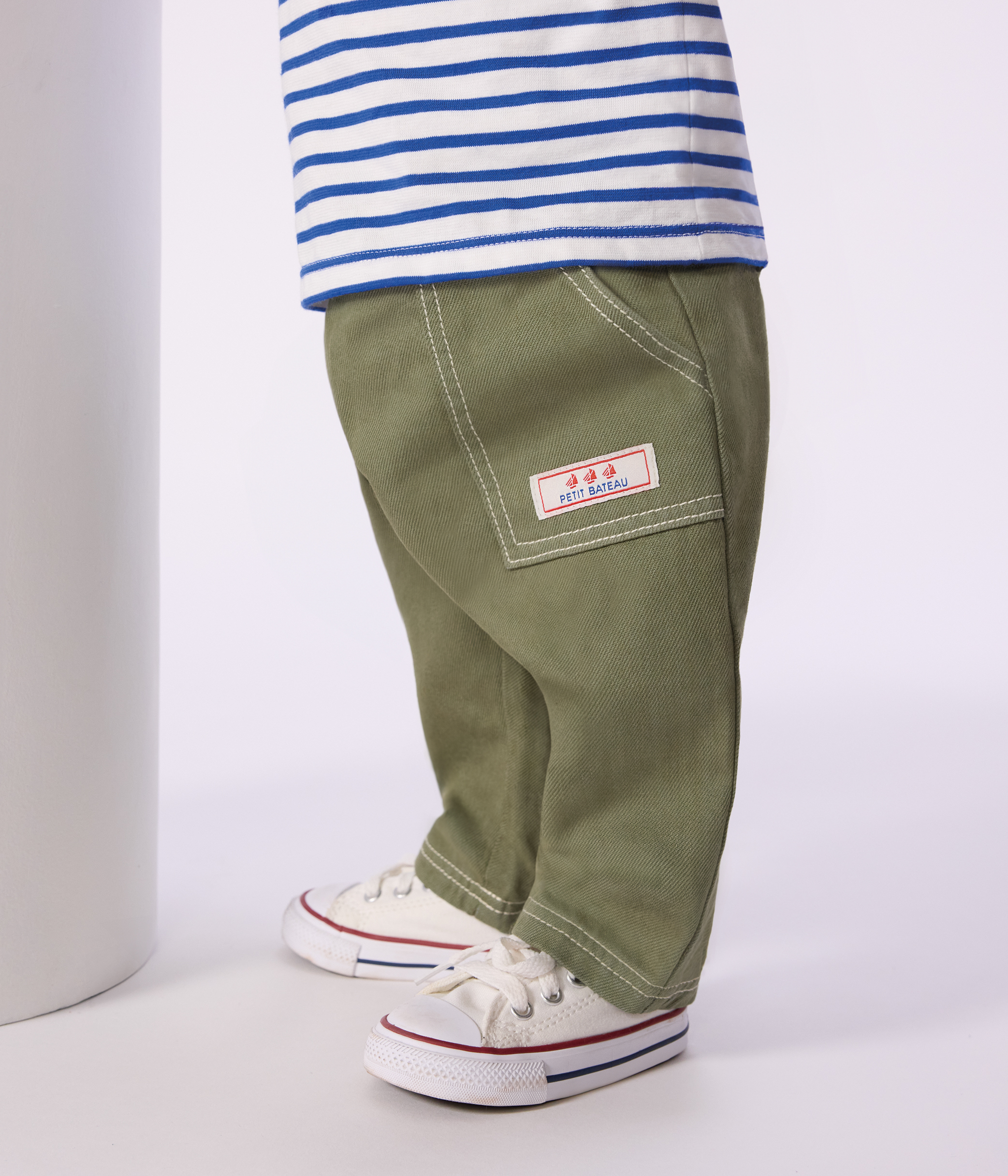 Babies' plain, coloured denim trousers