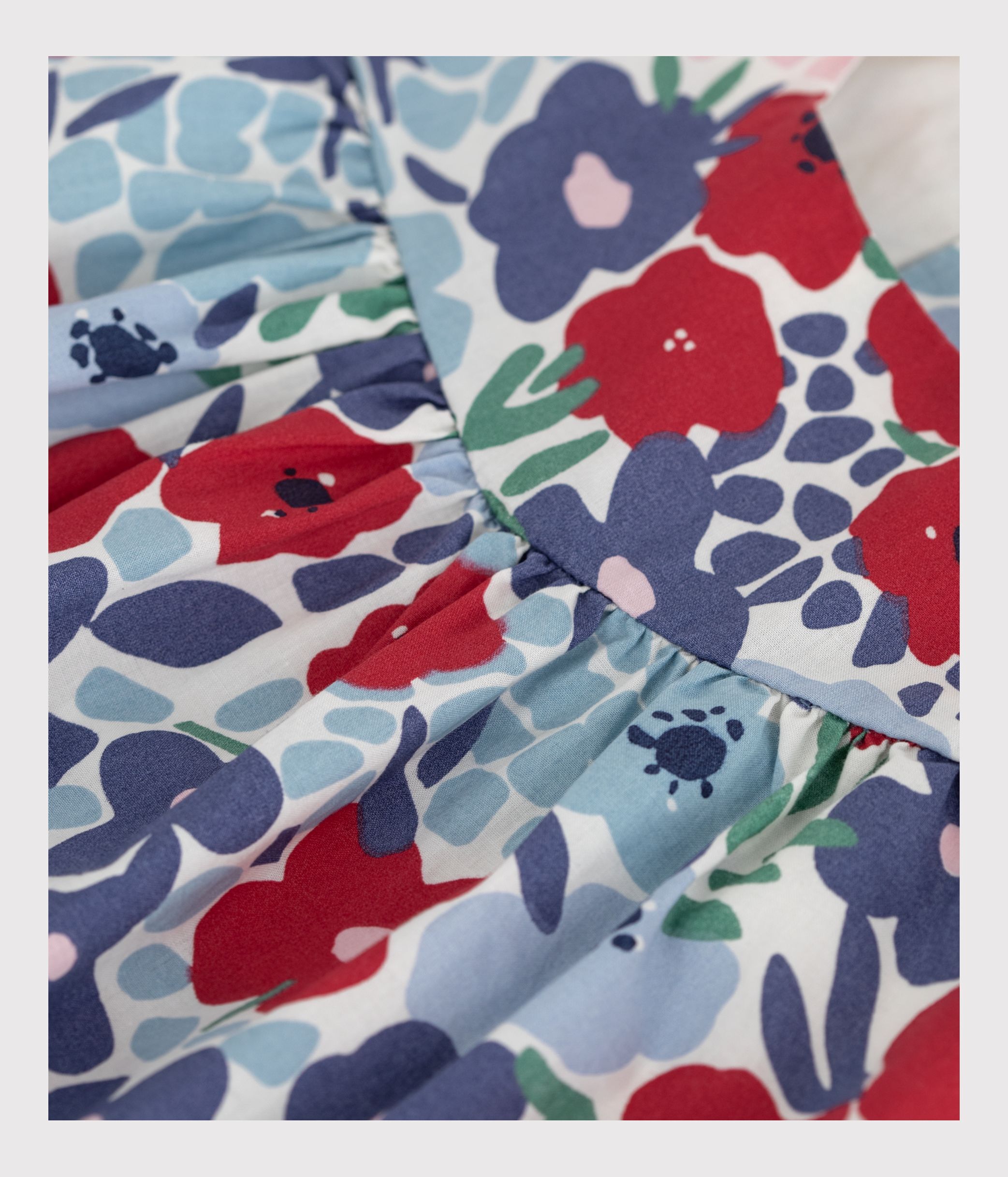 Babies' sleeveless cotton blouse with a floral print