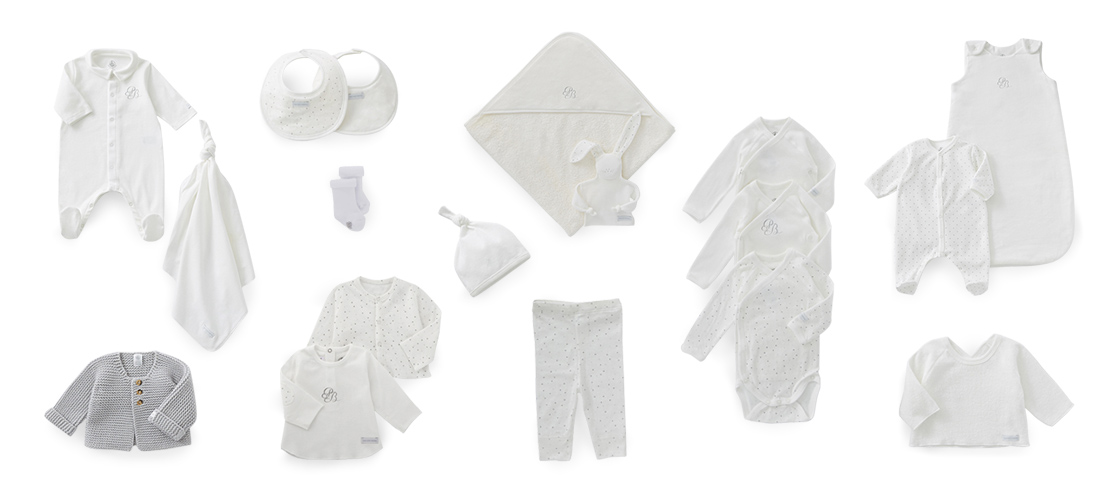 Maternity suitcase collection image showing baby essentials